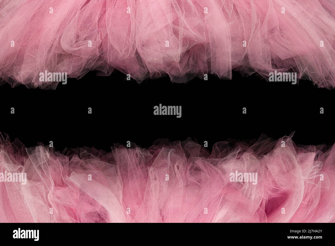 Pinkfarbener Tule-Tutu-Stoff, der für grafische Rahmen verwendet wird Stockfoto
