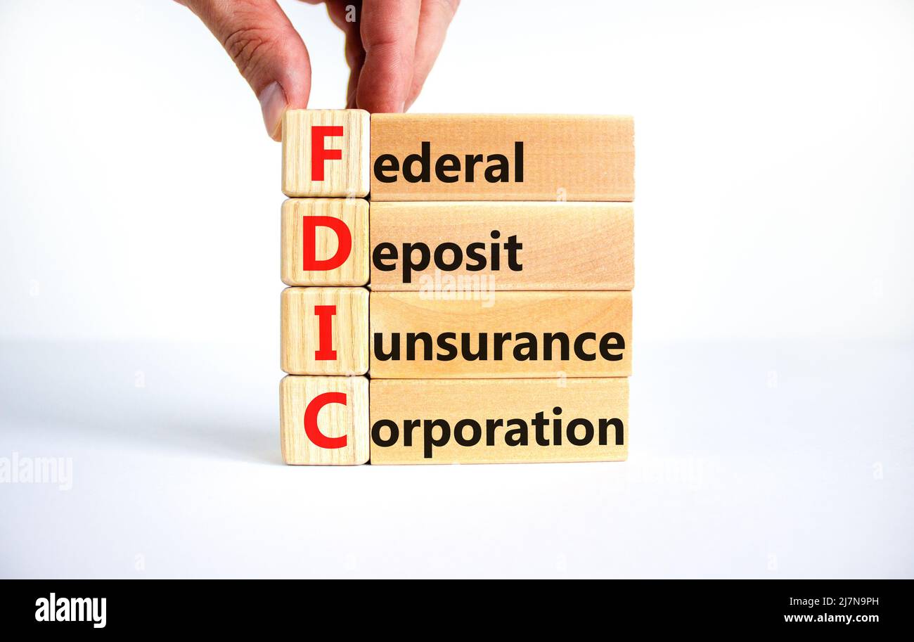 FDIC Bundeseinlagensicherungsgesellschaft Symbol. Konzept Worte FDIC Bundeseinlagensicherung auf Blöcken auf weißem Hintergrund. Business FD Stockfoto