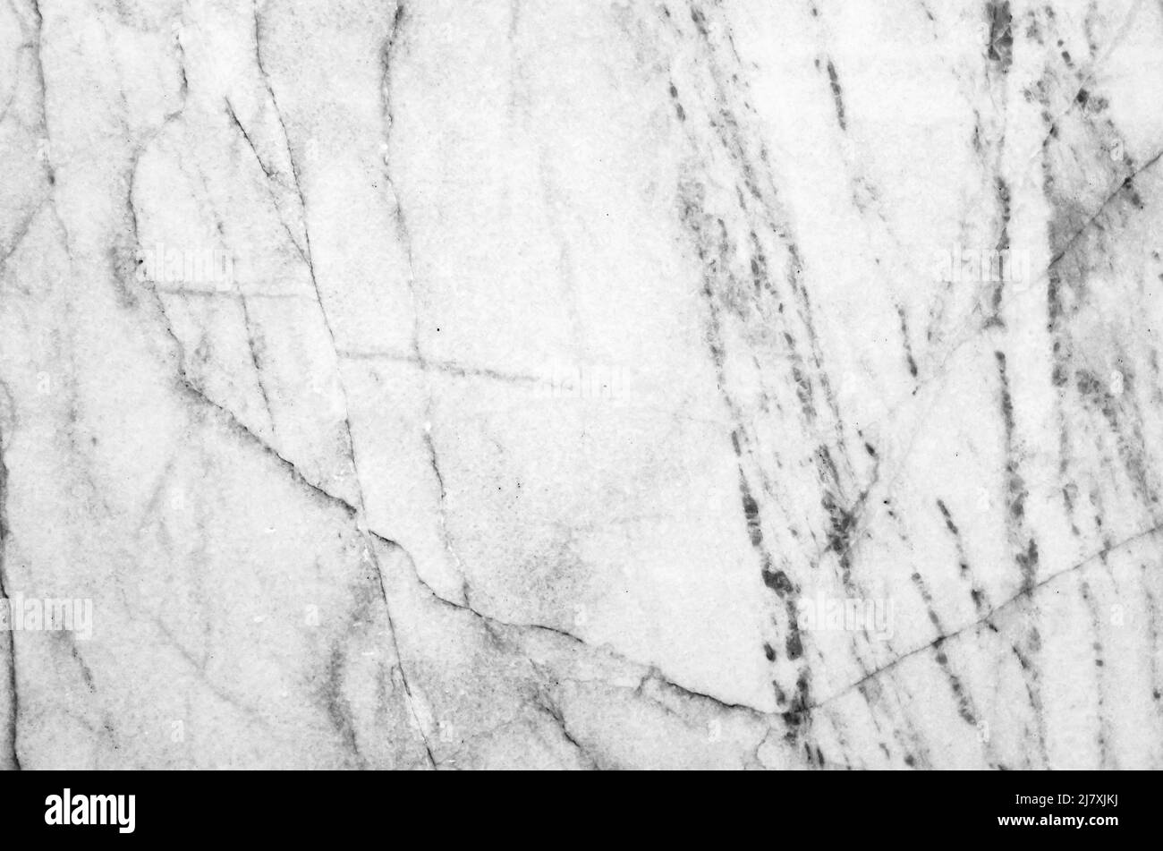 Natürlicher weißer Marmor mit grauem Adermuster, Nahaufnahme, Vorderansicht. Hintergrundtextur Stockfoto