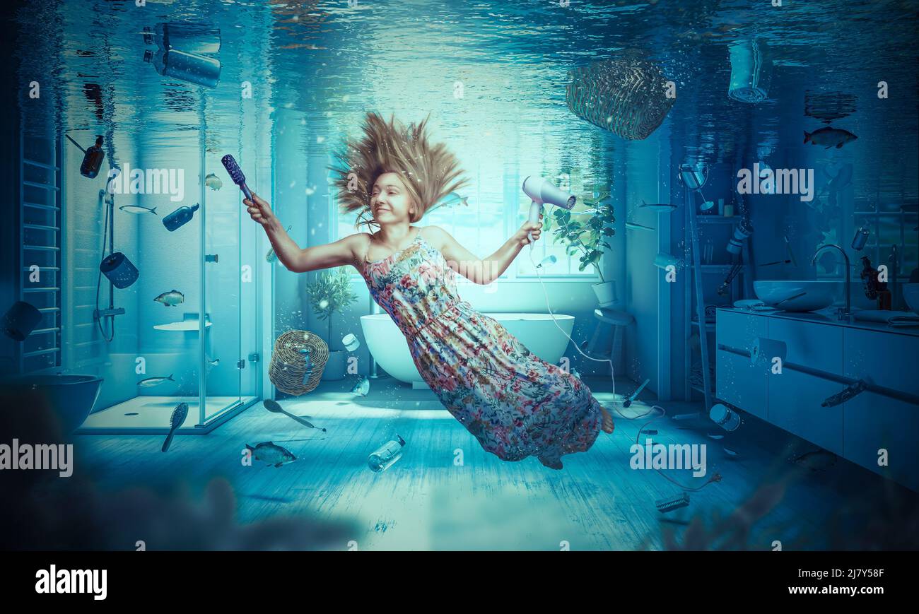 Frau schwimmt in einem überfluteten Badezimmer. Konzeptuelles Bild Stockfoto