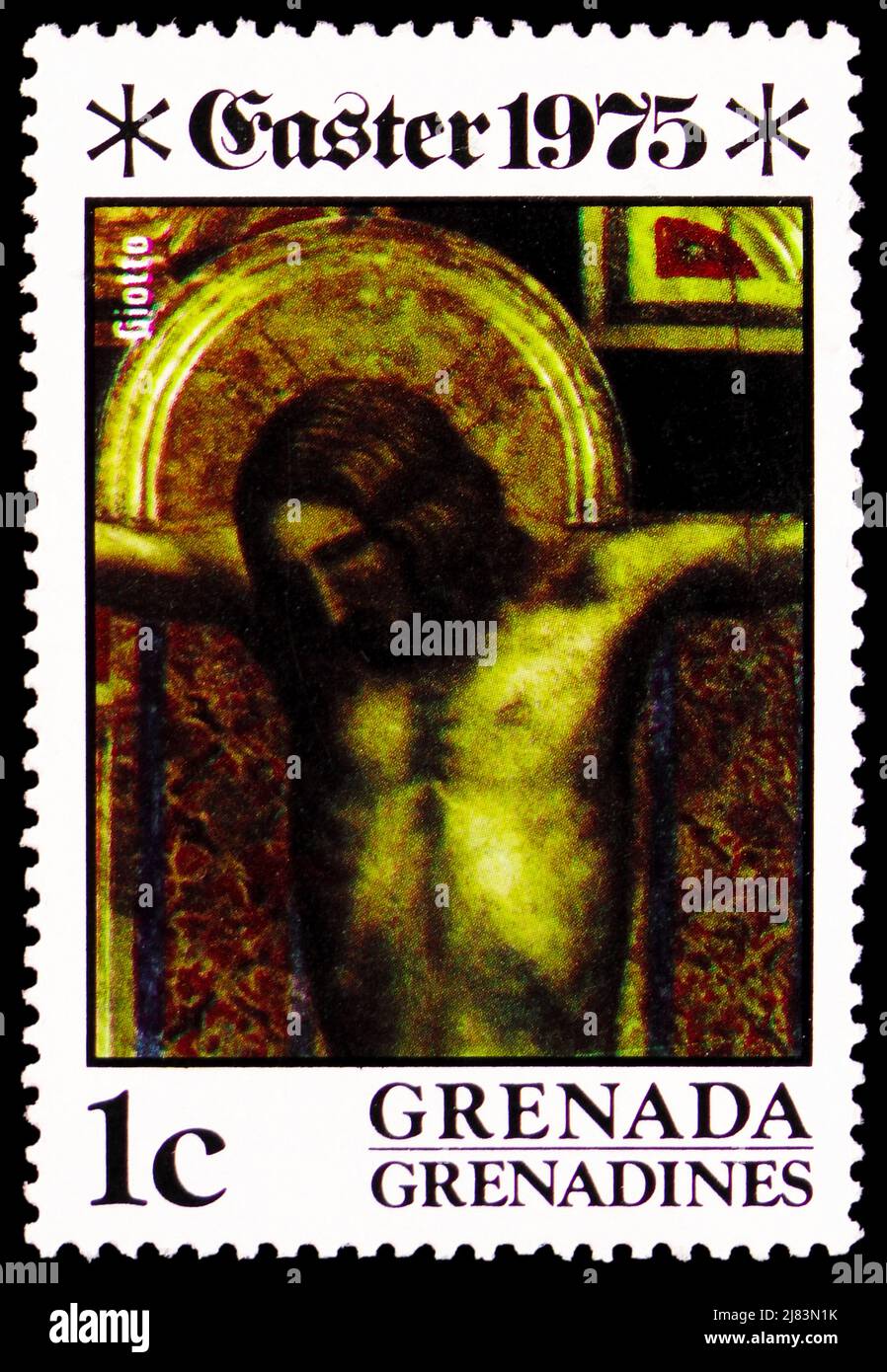 MOSKAU, RUSSLAND - 10. APRIL 2022: Briefmarke gedruckt in Grenada Grenadinen zeigt das Kruzifix (Ausschnitt) - Giotto, Ostern - Gemälde der Kreuzigung Stockfoto