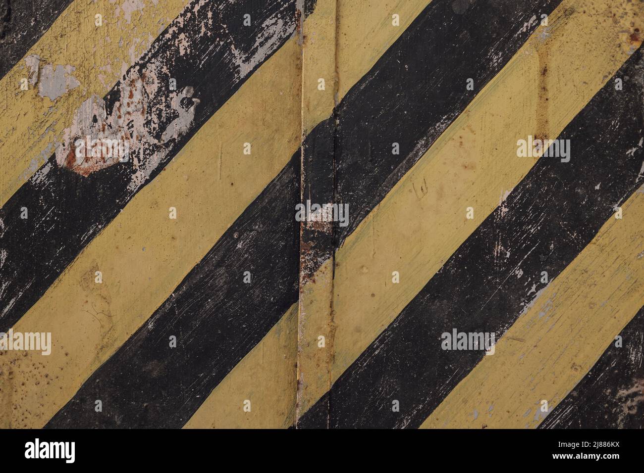 Schwarze und gelbe Linien auf einem Hintergrund grunge alt Stockfoto
