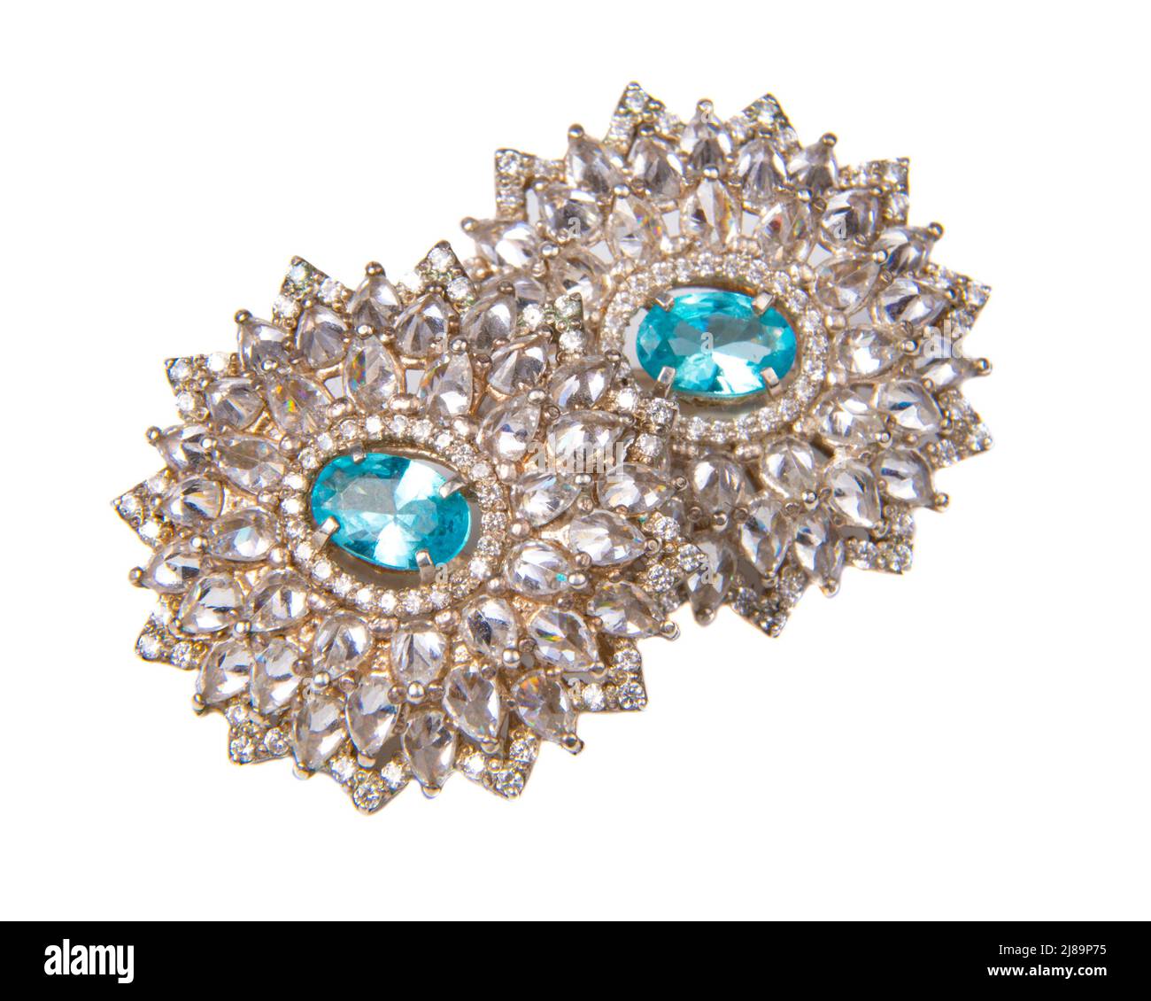 Diamant-Ohrringe mit blauem Stein Luxus Schmuck Makro-Nahaufnahme Stockfoto