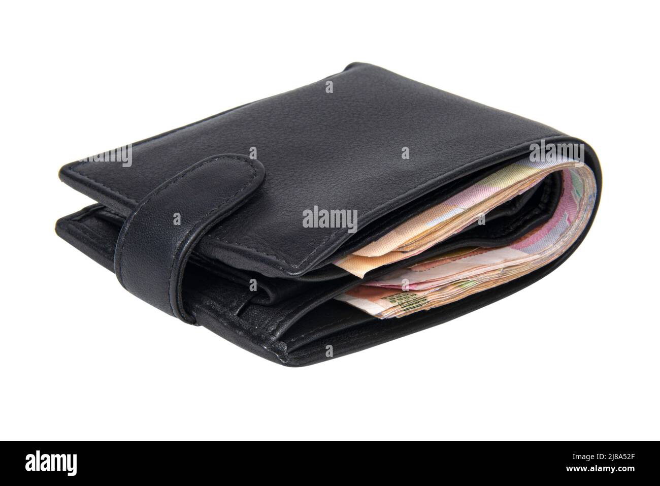 Schwarze Leder-Geldbörse mit isoliertem Geld auf weißem Hintergrund Stockfoto