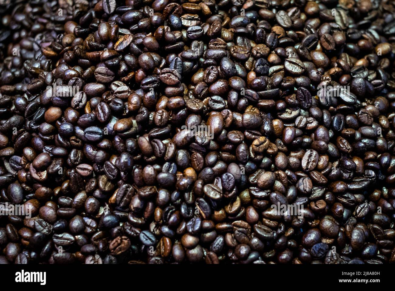 Kaffeebohnen Nahaufnahme, Kaffee Hintergrund Stockfoto