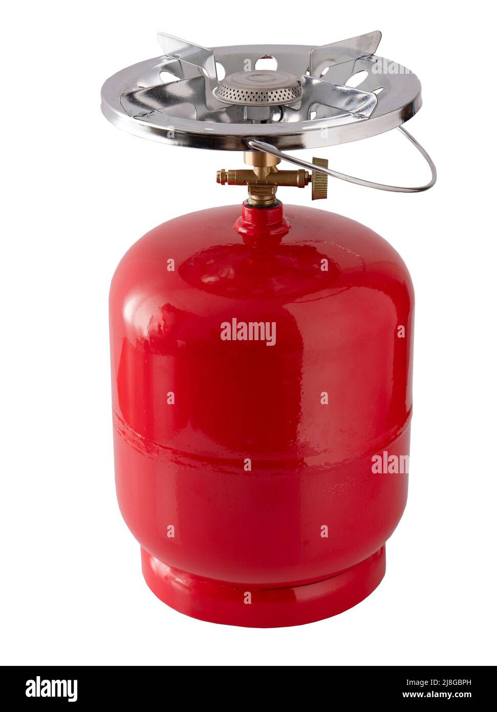 Tragbare Gasflasche. Eine kleine kompakte Reiseflasche mit einem Brenner zum Kochen auf einer Wanderung. Der Gasofen der Straße ist mit Propan gefüllt. Roter Tank. Stockfoto