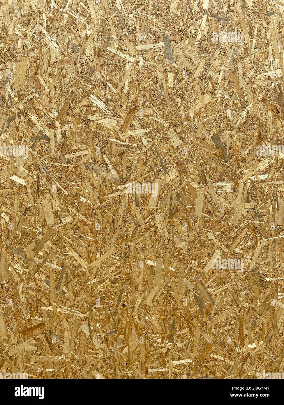 Abstrakter Hintergrund: Komprimiertes Holzbrett aus Splittern Stockfoto