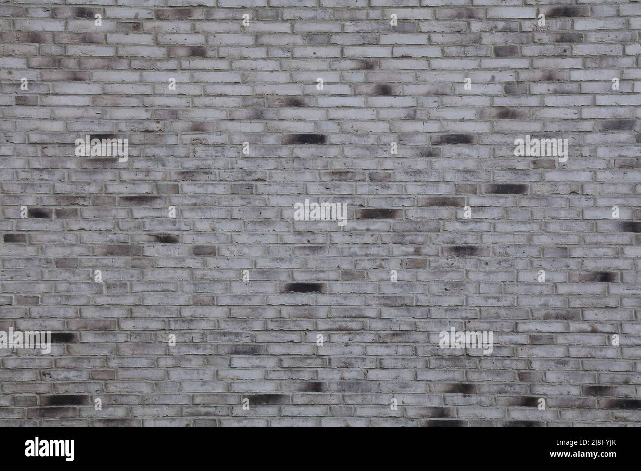 Grauer Backstein Wand Hintergrund. Graue Ziegelstruktur. Stockfoto