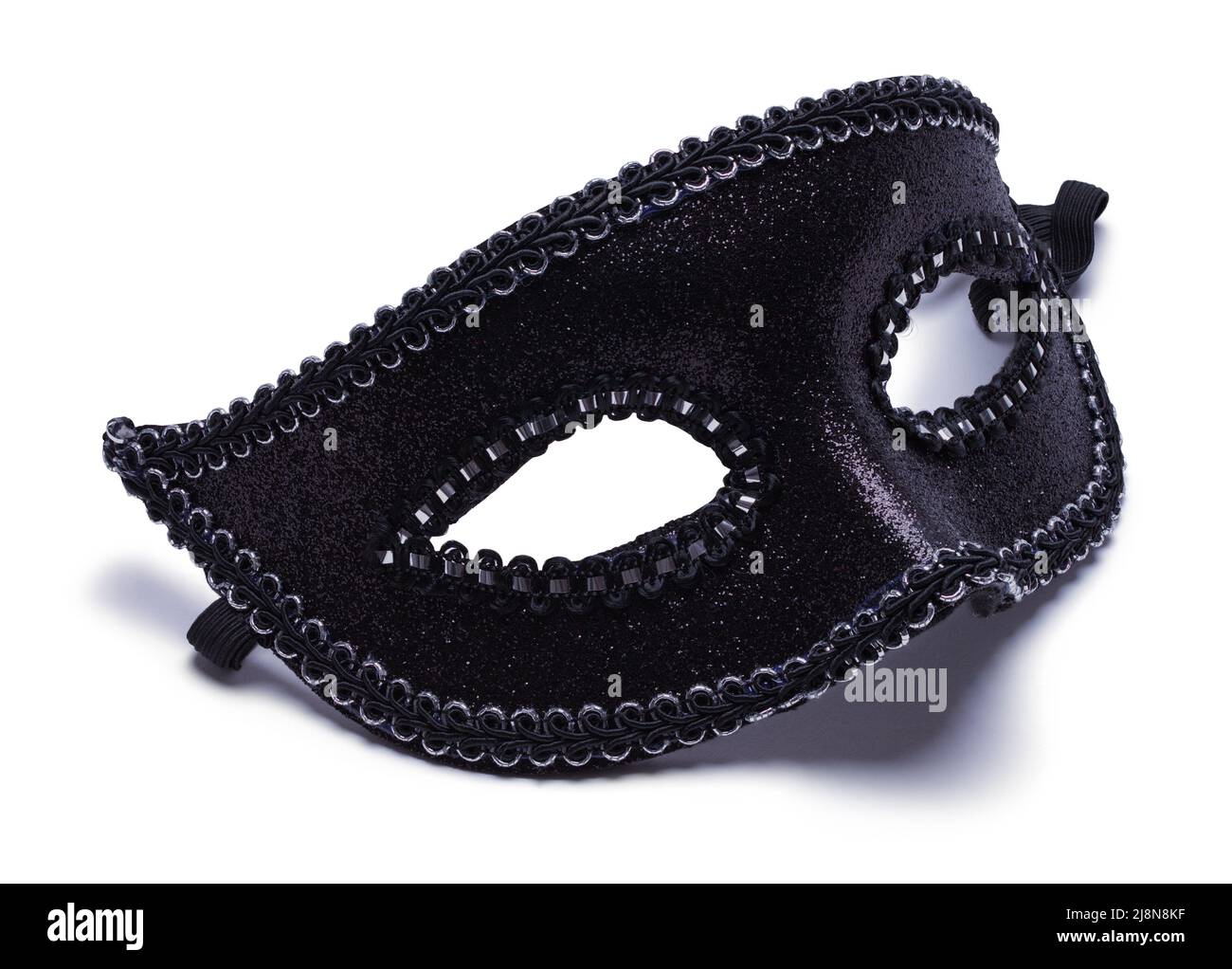 Schwarze Venezianische Maskenball Maske auf Weiß ausgeschnitten. Stockfoto