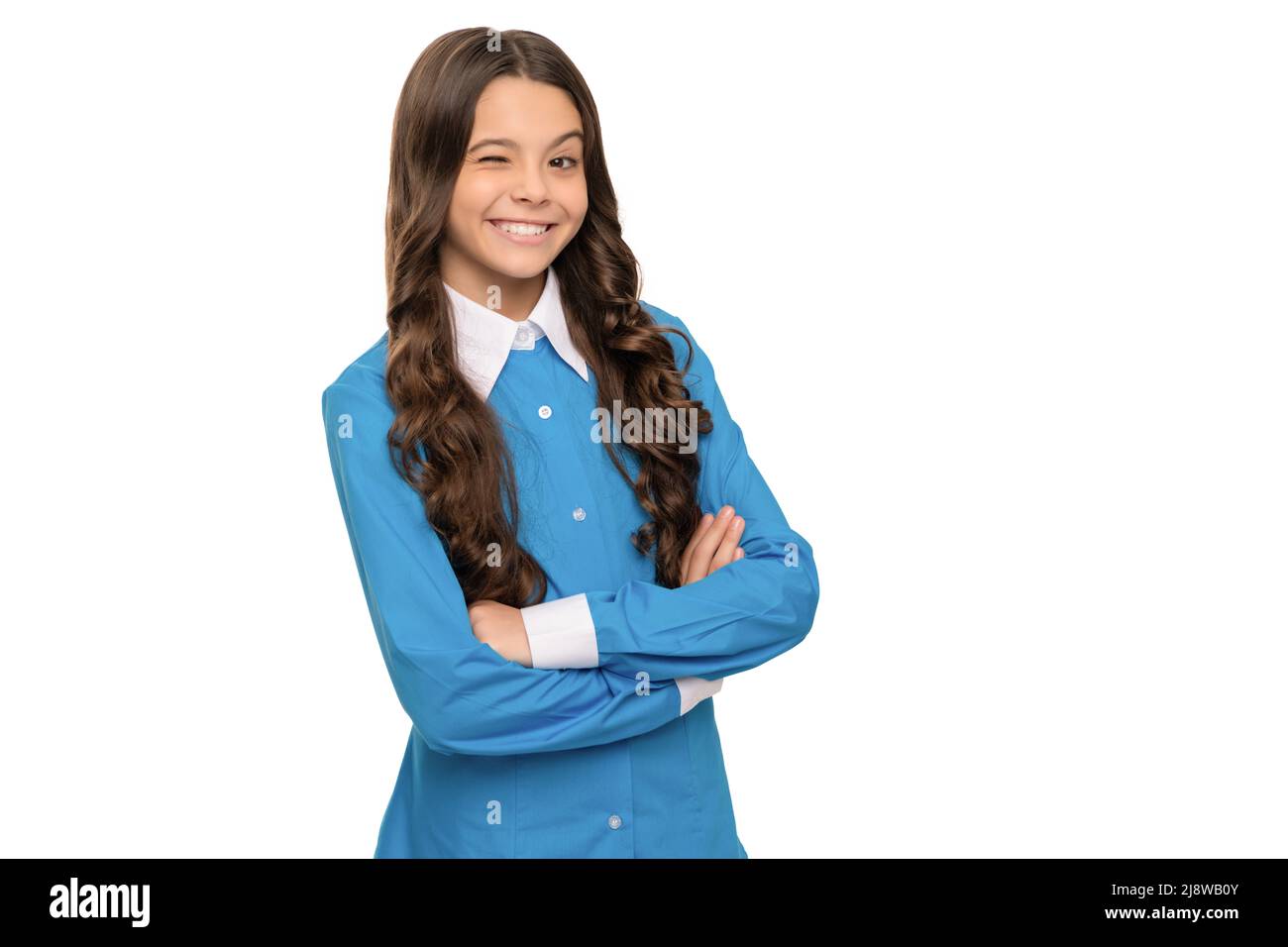 ausdruck positiver Emotionen. Gesichtspflege. Zwinkern Kind mit lockigen Haaren. Schönheit und Mode. Stockfoto