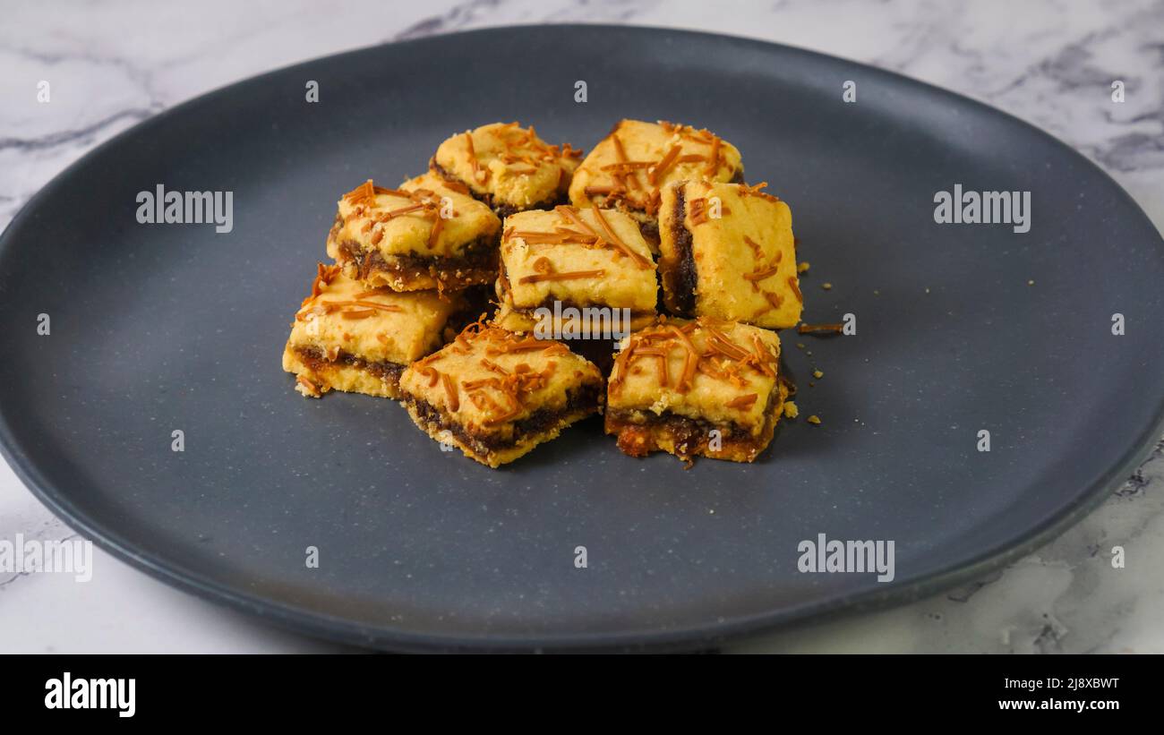 Ananaskäse-Tarte ist eine Fusion aus Ananasherb, einem kleinen, mundgroßen Tarte, gefüllt oder gekrönt mit Ananasmarmelade, der zusätzlichen Bestandteil von Käse, com, hinzufügt Stockfoto
