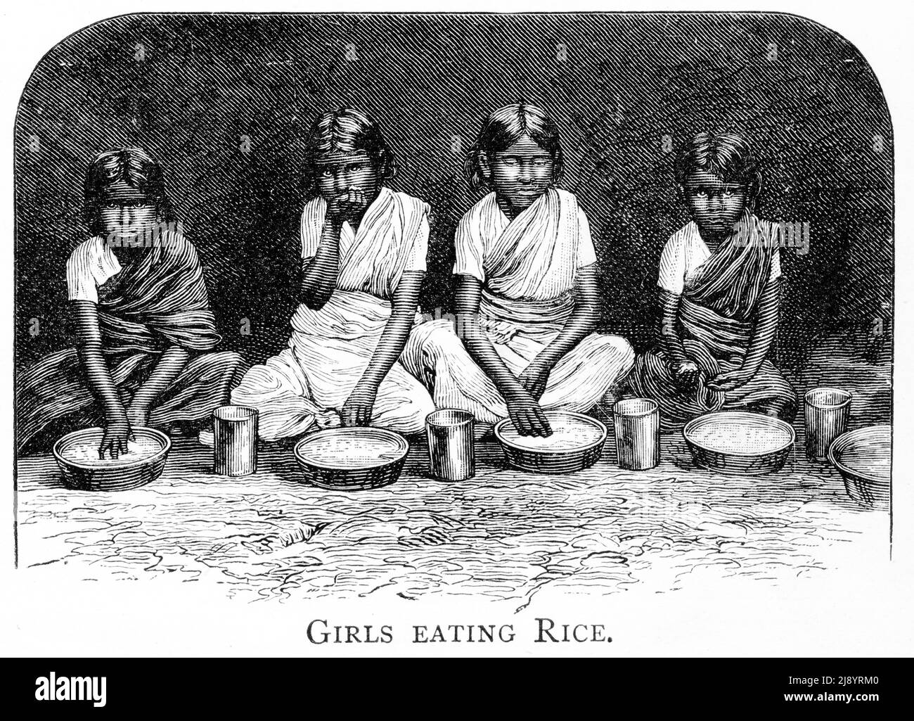 Gravur von Mädchen, die Reis in Indien essen, um 1880 Stockfoto