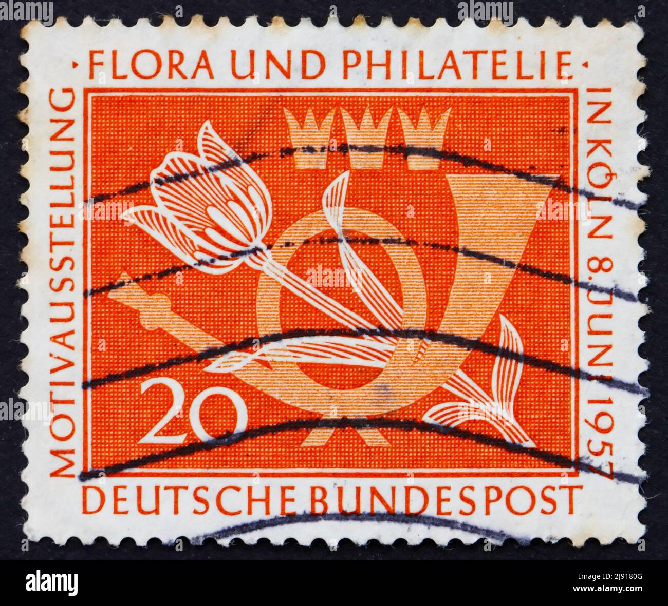 DEUTSCHLAND - UM 1957: Eine in Deutschland gedruckte Briefmarke zeigt Tulip and Post Horn, Flora and Philatelie Exhibition, Köln, um 1957 Stockfoto