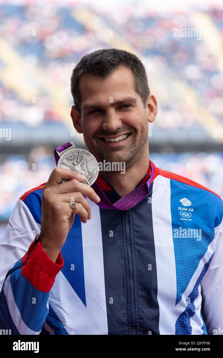 Birmingham, Großbritannien. 21.. Mai 2022. Robbie Grabarz vom Team GB erhält eine Silbermedaille für den London 2012 High Jump, nachdem Ivan Ukhov bei der Müller Diamond League Leichtathletik-Veranstaltung im Alexander Stadium in Birmingham, Großbritannien, die Goldmedaille abgezogen wurde. Kredit: Sporting Pics / Alamy Live Nachrichten Stockfoto