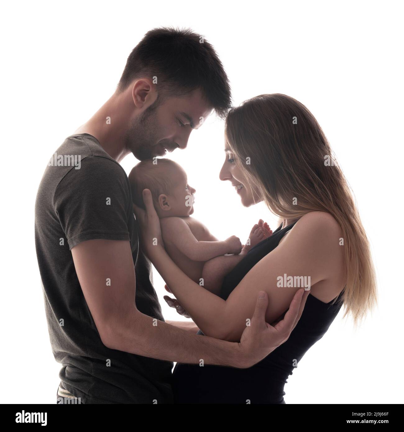 Eltern mit ihrem neugeborenen Baby im Studio Stockfoto