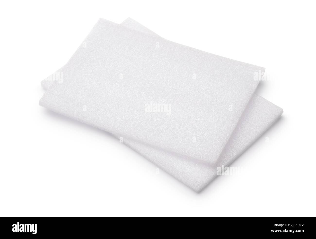 Zwei weiße, auf Weiß isolierte Polyethylenschaumplatten Stockfoto