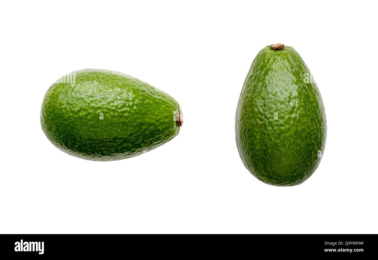 Zwei natürliche grüne Avocado isoliert auf weiß, Draufsicht, Seitenansicht Stockfoto