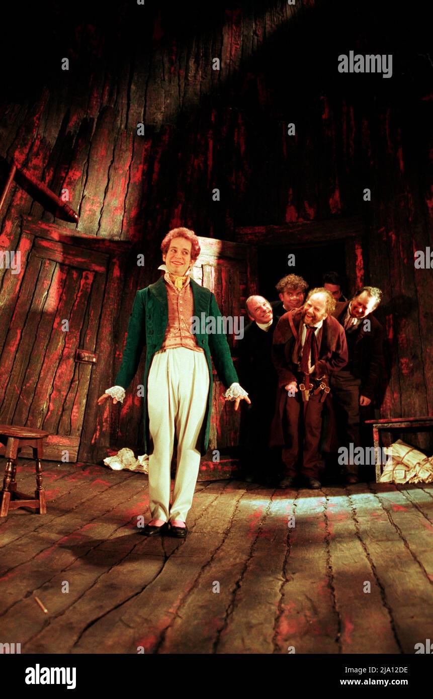 Vorne: Tom Hollander (Khlestakov) hinten Mitte: Ian McDiarmid (Lord Provost) im REGIERUNGSKOMMISSAR von Gogol am Almeida Theater, London N1 17/12/1997 in einer neuen Adaption von John Byrne Design: Rob Howell Beleuchtung: Mark Henderson Regie: Jonathan Kent Stockfoto