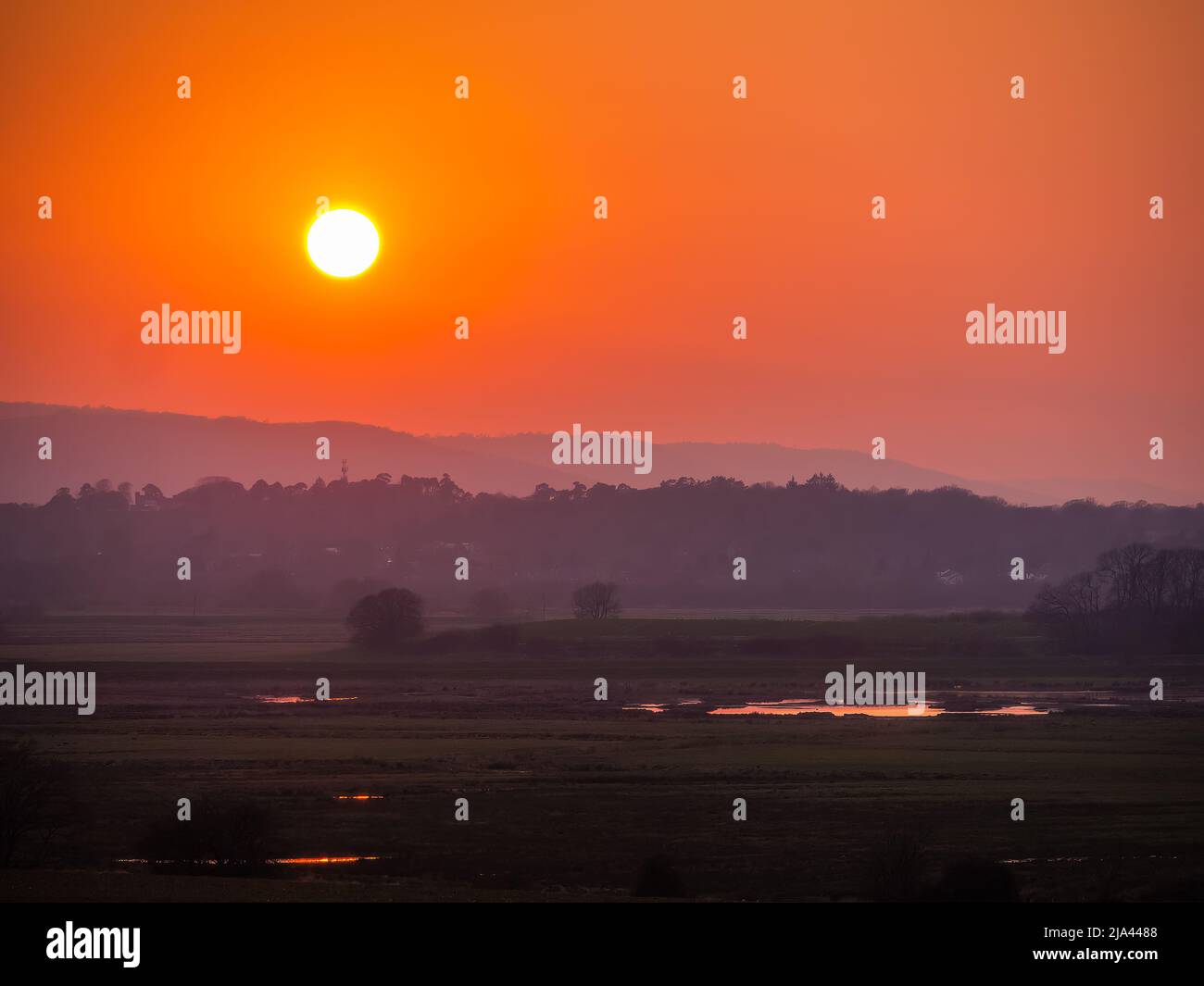 Sonnenuntergang über dem RSPB Reserve Wiggonholt West Sussex UK Stockfoto