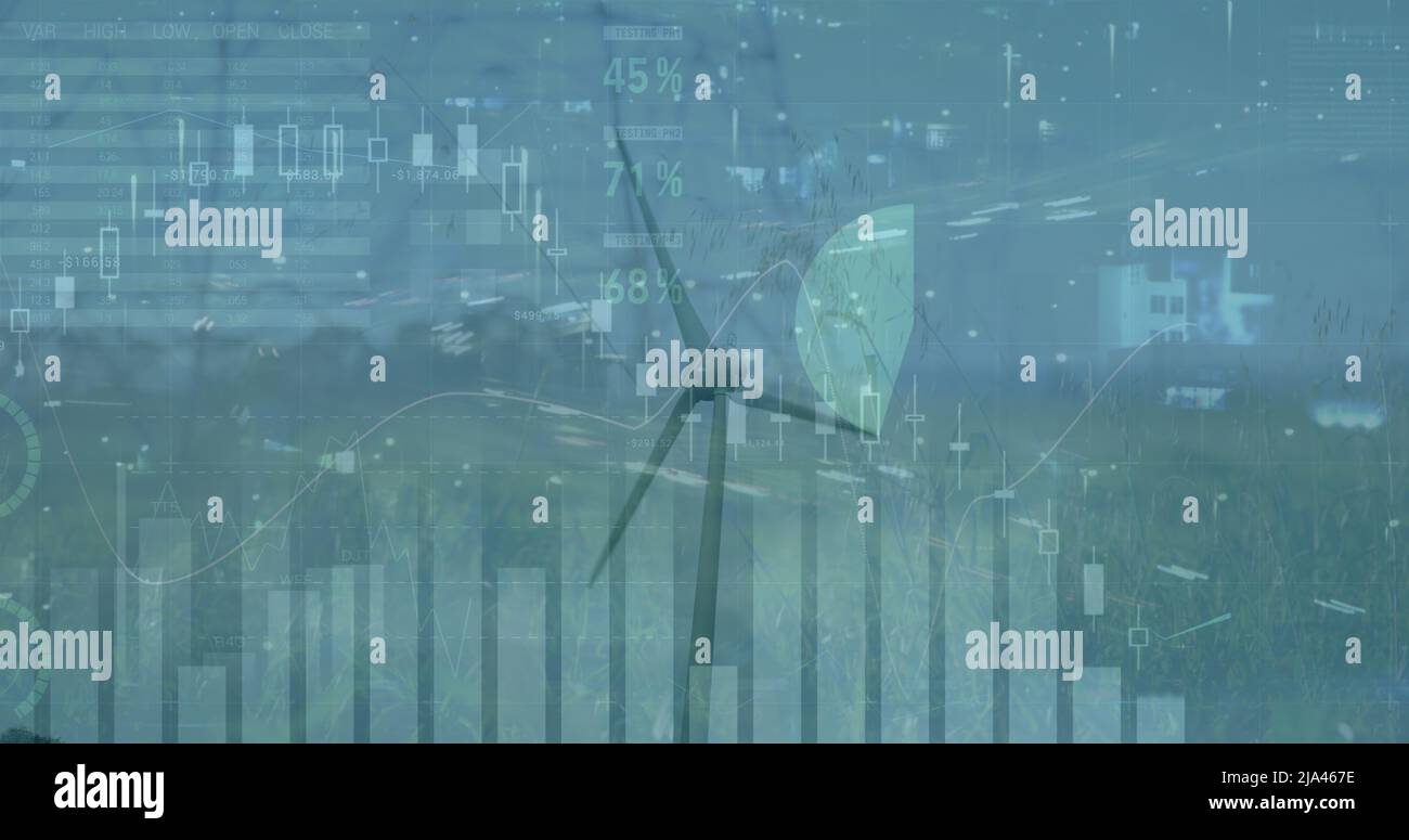 Bild der finanziellen Datenverarbeitung über der Windmühle Stockfoto