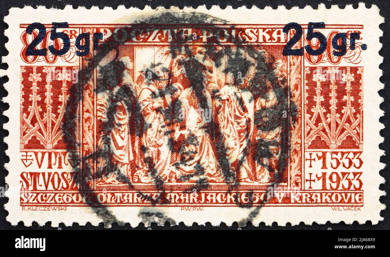 POLEN - UM 1934: Eine in Polen gedruckte Briefmarke zeigt die Altartafel der St. Mary's Church, Krakau, 400.. Todestag von Veit Stoss, Bildhauer und Stockfoto