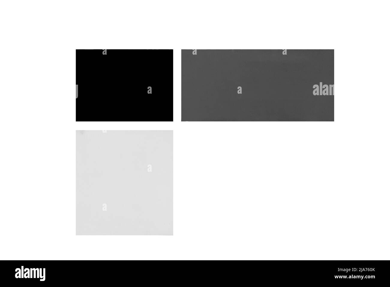 Leere monochrome Quadrate abstraktes Design blank graue Würfel auf weißem imitiertem Hintergrund isoliert. Stockfoto