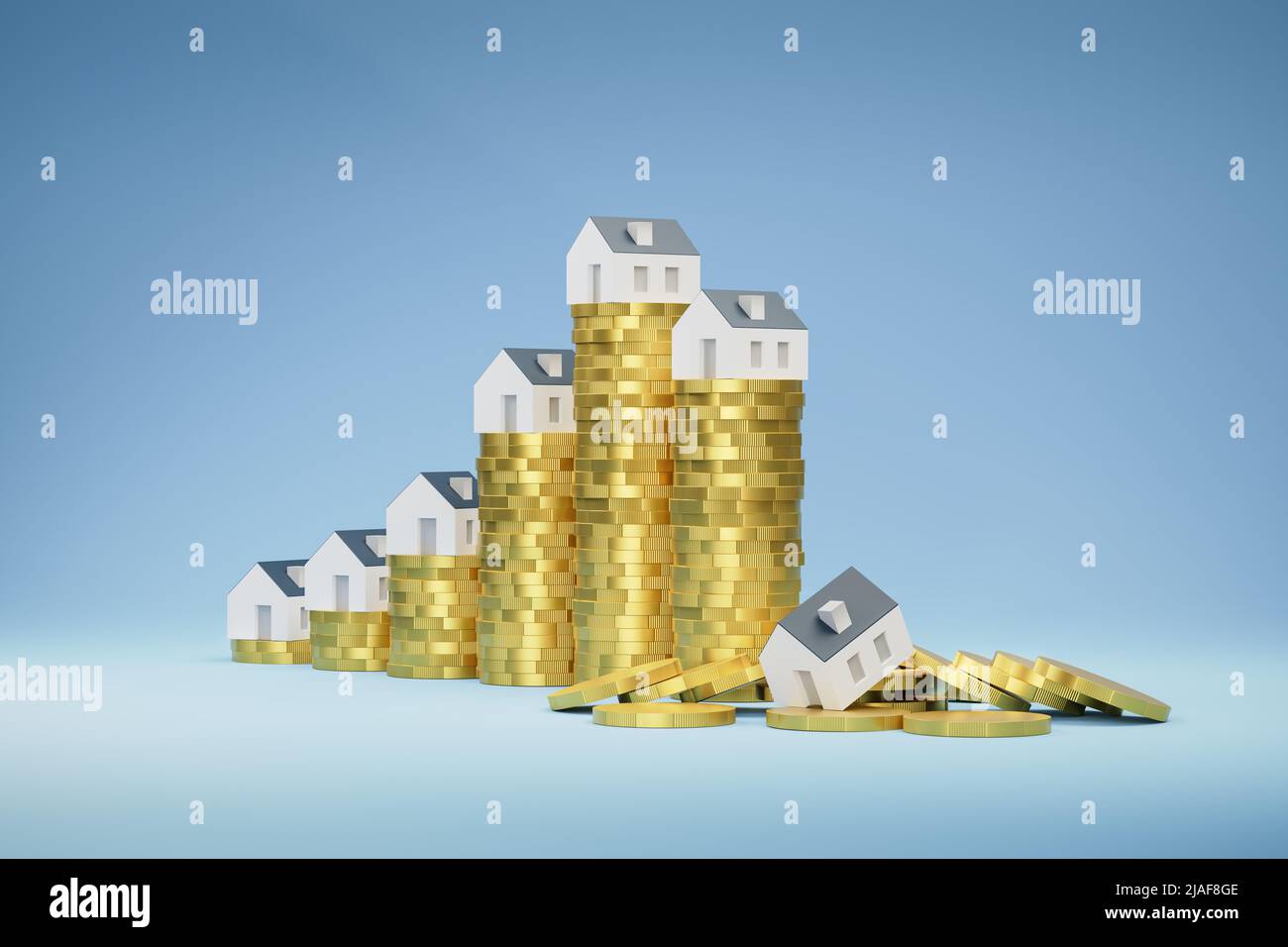 Konzept der Immobilienblase: Rückgang der Immobilienpreise aufgrund der Korona- und Kriegskrise. Steigende und fallende Stapel von Münzen mit Häusern gekrönt. Letzter Stapel Stockfoto
