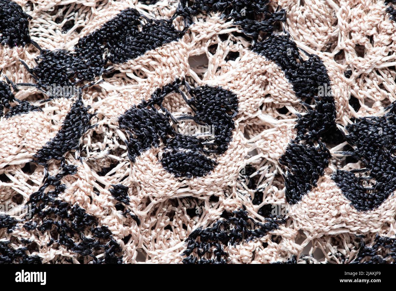 Graues Faltenmaterial, Hintergrund Makro strukturiert Stockfoto