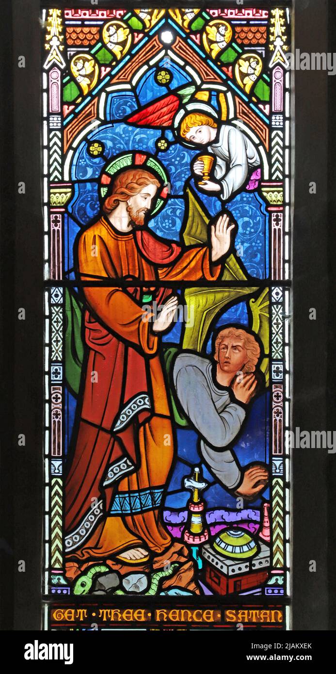 Ein Buntglasfenster von Frederick Preedy mit Darstellung der Versuchung Christi in der Wildnis, der Holy Trinity Church, Arrow, Warwickshire Stockfoto