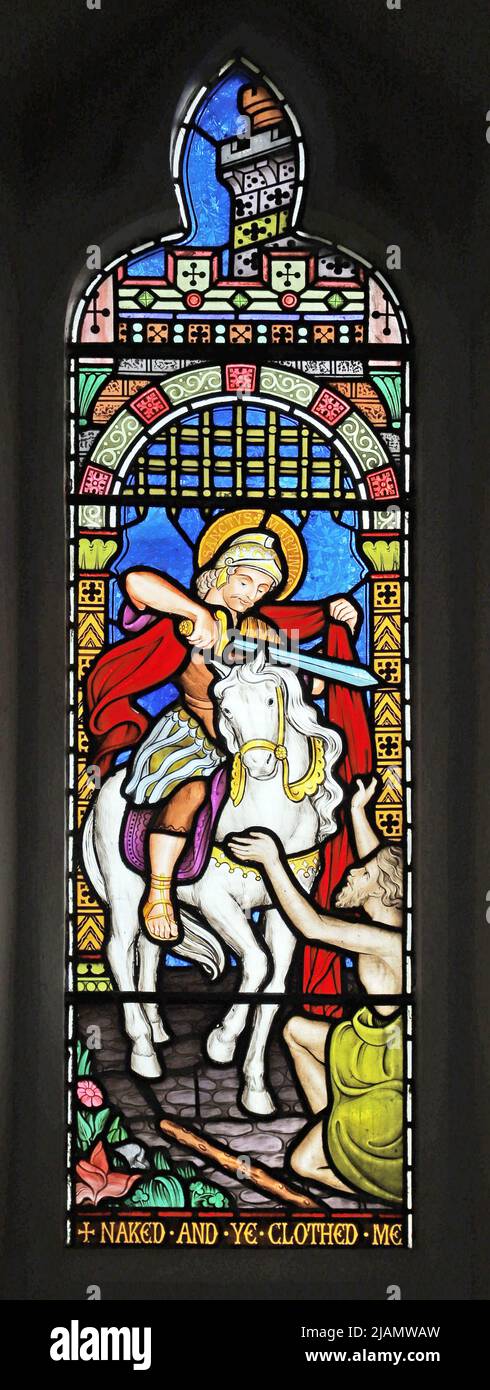 Ein Buntglasfenster von Frederick Preedy, das St. Martin von Tours und den Bettler, die Allerheiligen-Kirche, die Kirche Lench, Worcestershire, zeigt Stockfoto