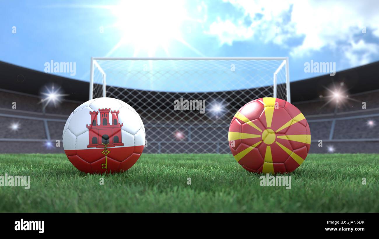 Zwei Fußballbälle in Flaggen-Farben auf Stadion verschwommener Hintergrund. Gibraltar und Nord-Mazedonien. 3D Bild Stockfoto