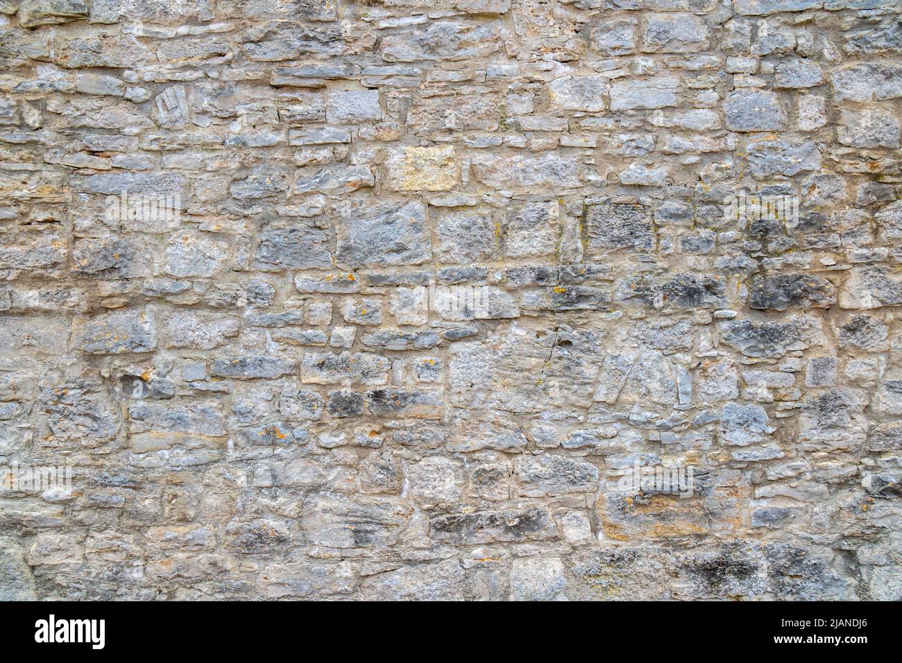 Historische Mauer mit alten Steinen Stockfoto