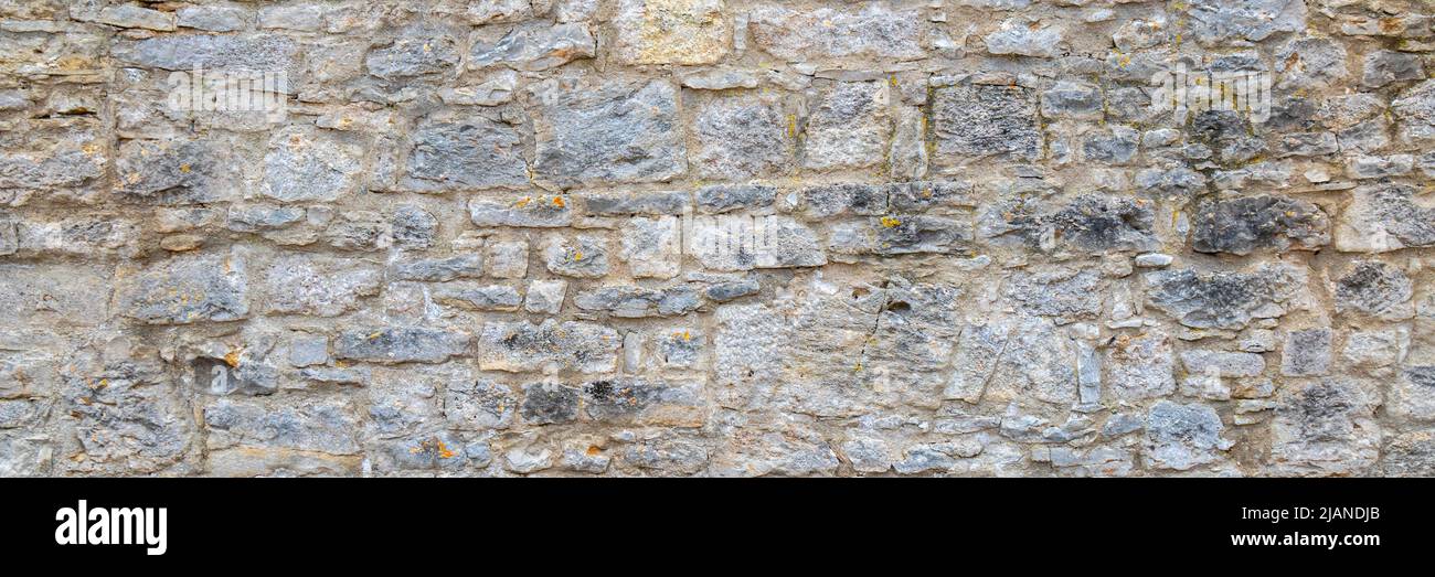 Historische Mauer mit alten Steinen Stockfoto