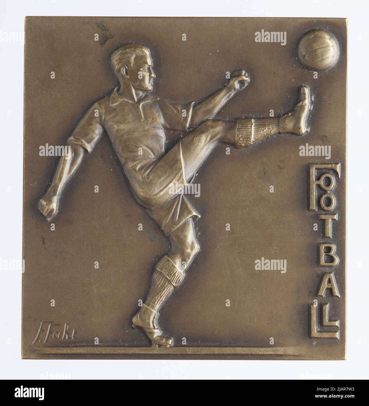 Medaille in Form einer Plakette: Fußball Stockfoto