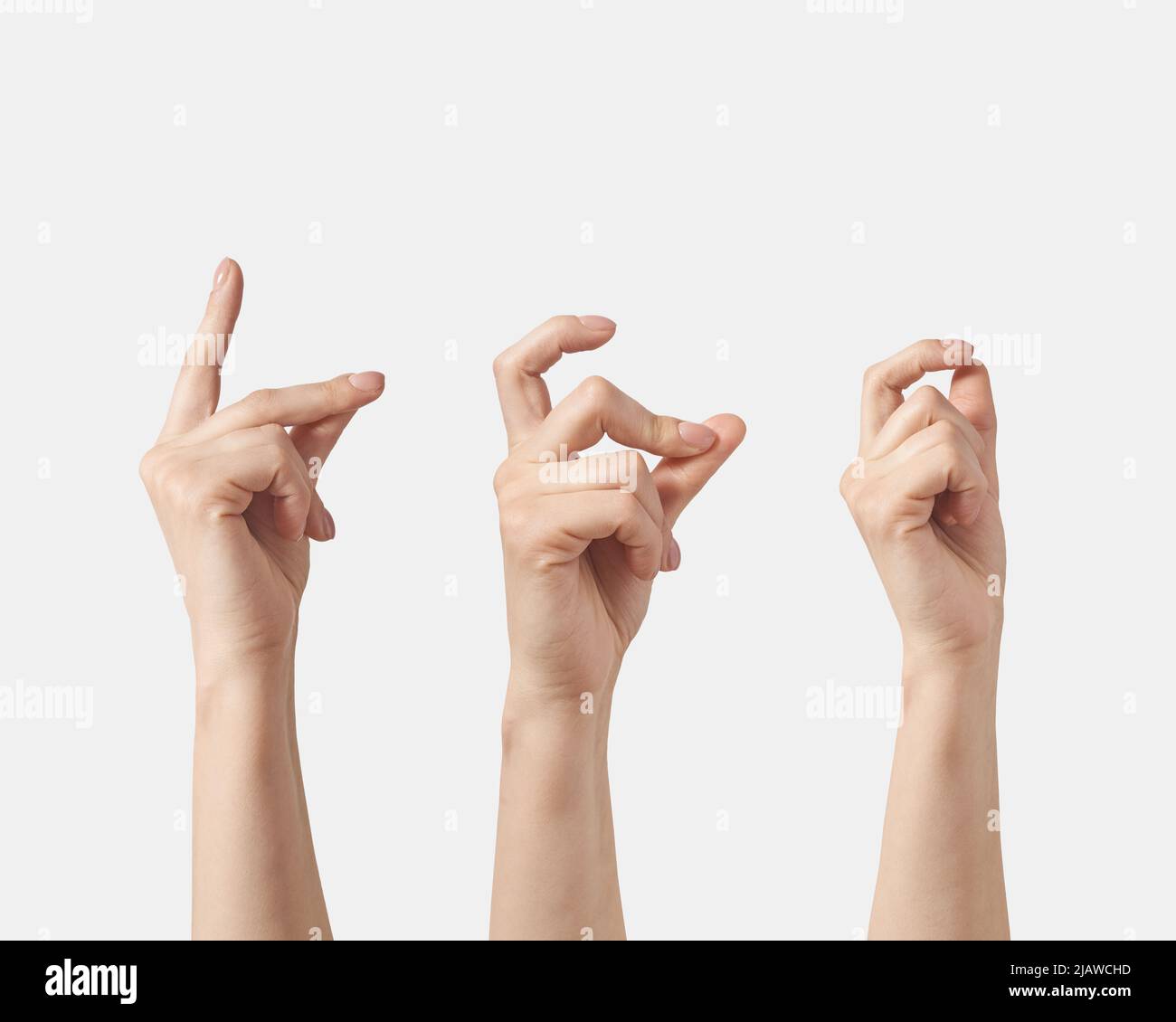 Satz weiblicher Hand, die die Fingerbewegung auf weißem Hintergrund abknipst. Stockfoto