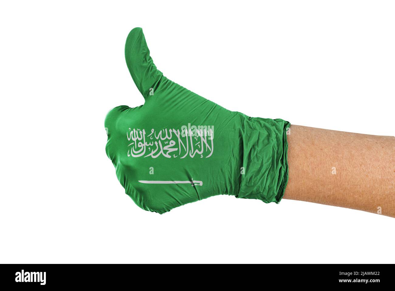 Saudi-Arabien Flagge auf einem medizinischen Handschuh zeigt Daumen nach oben Zeichen Stockfoto