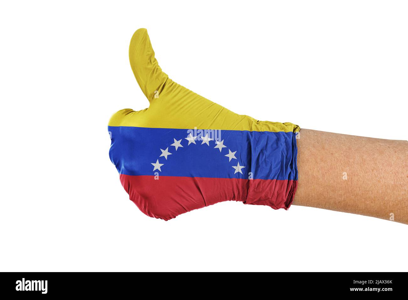 Venezuela-Flagge auf einem medizinischen Handschuh mit Daumen nach oben Zeichen Stockfoto