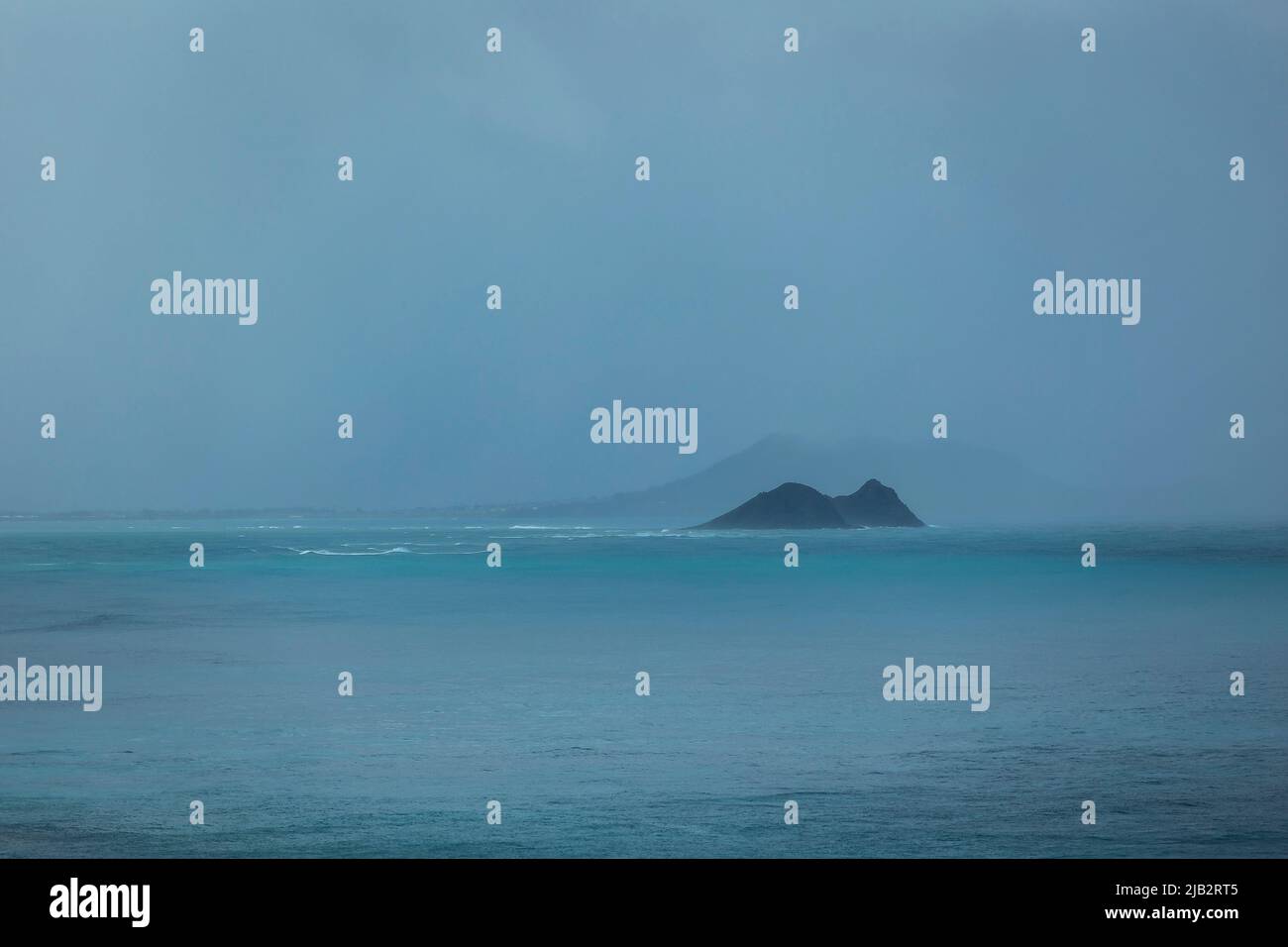 Die Mokes im Regensturm, Oahu, Hawaii Stockfoto