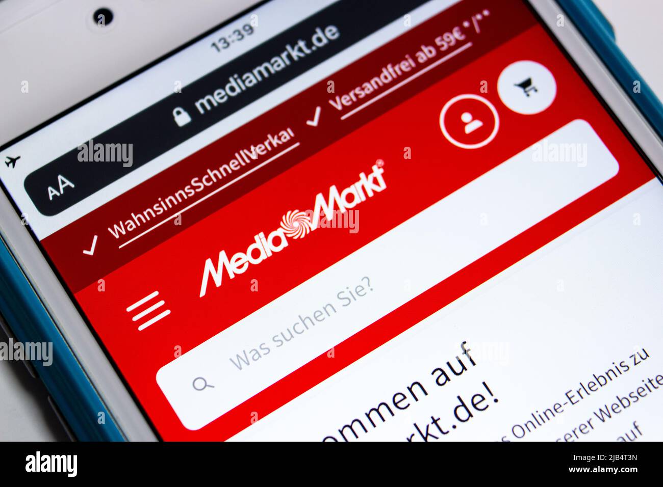 Logo von MediaMarkt, einer deutschen multinationalen Kette von Geschäften, die Unterhaltungselektronik mit über 1000 Geschäften in Europa verkaufen, auf ihrer iPhone-Website Stockfoto