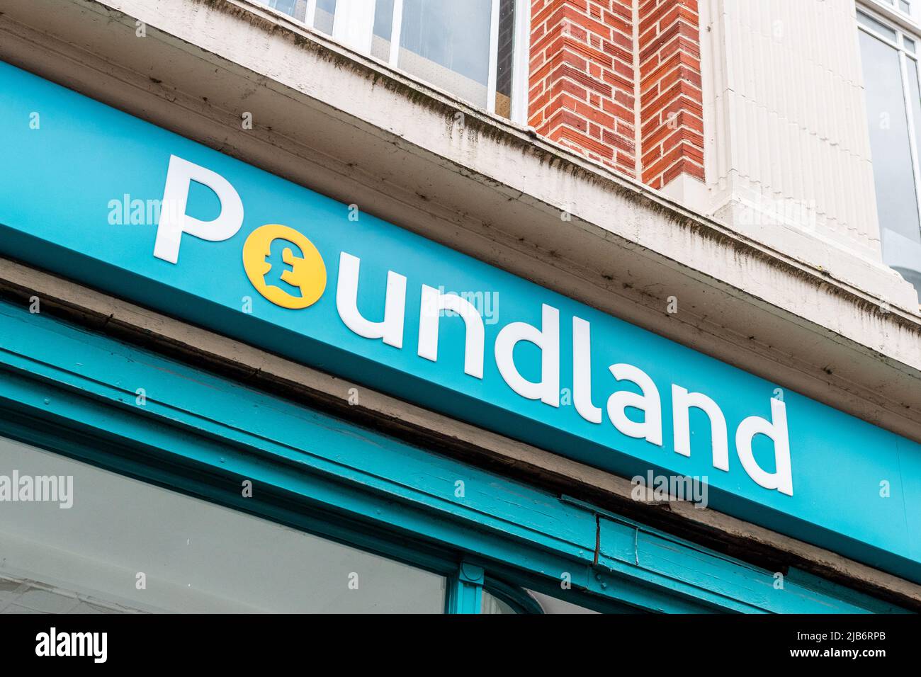 Discounter Poundland Schild/Shop Front in Großbritannien. Stockfoto