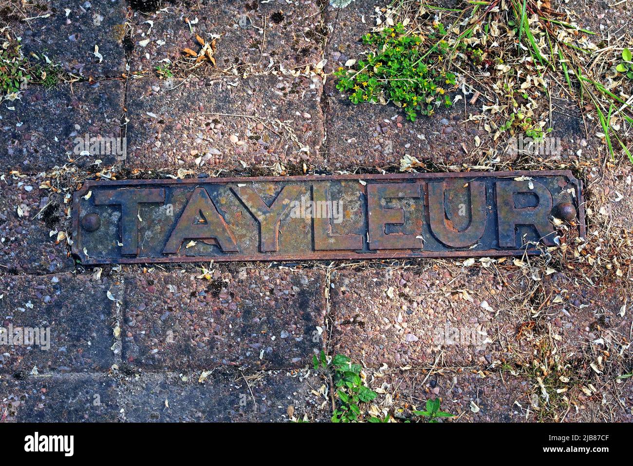 Tayleur-Gussplatte, Derby Row, Vulcan Village, Warrington, ehemalige Eisenbahnfabrik Charles Tayleur, Newton-Le-Willows, Geschichte, Lancashire Stockfoto