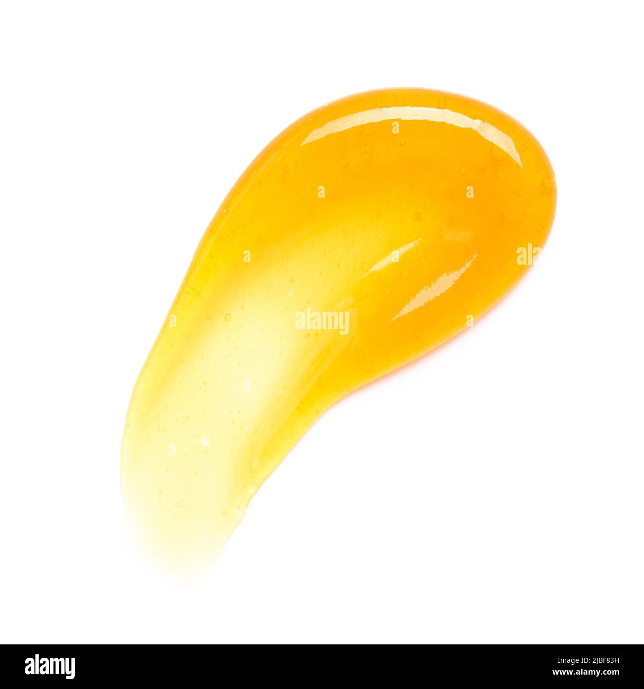 Transparente gelbe Gel-Creme verschmieren mit Blasen Makro isoliert auf weißem Hintergrund Draufsicht Stockfoto