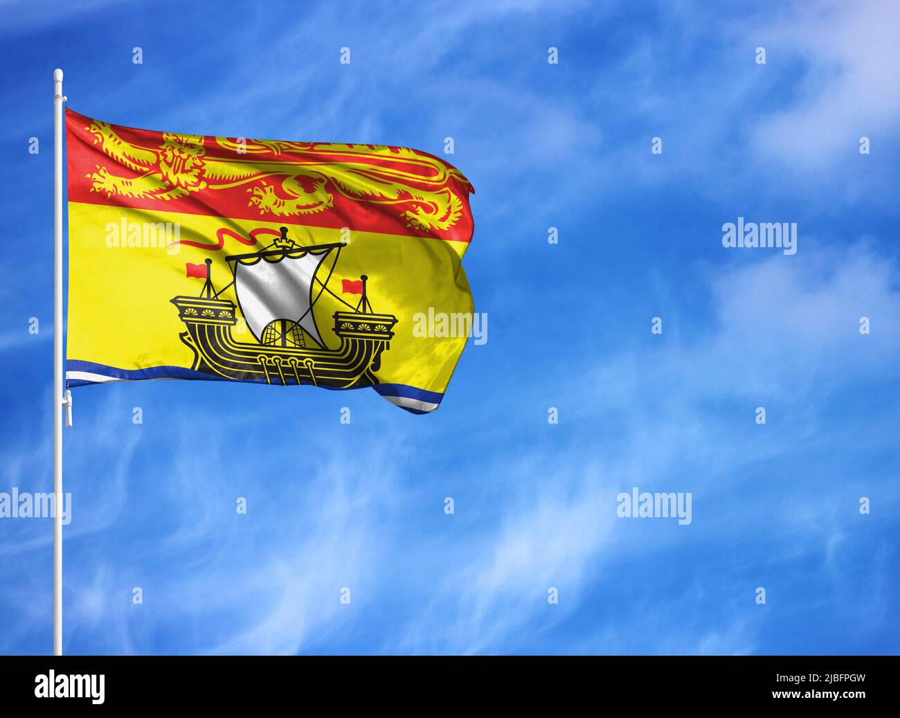 Nationalflagge von New Brunswick auf einem Fahnenmast Stockfoto