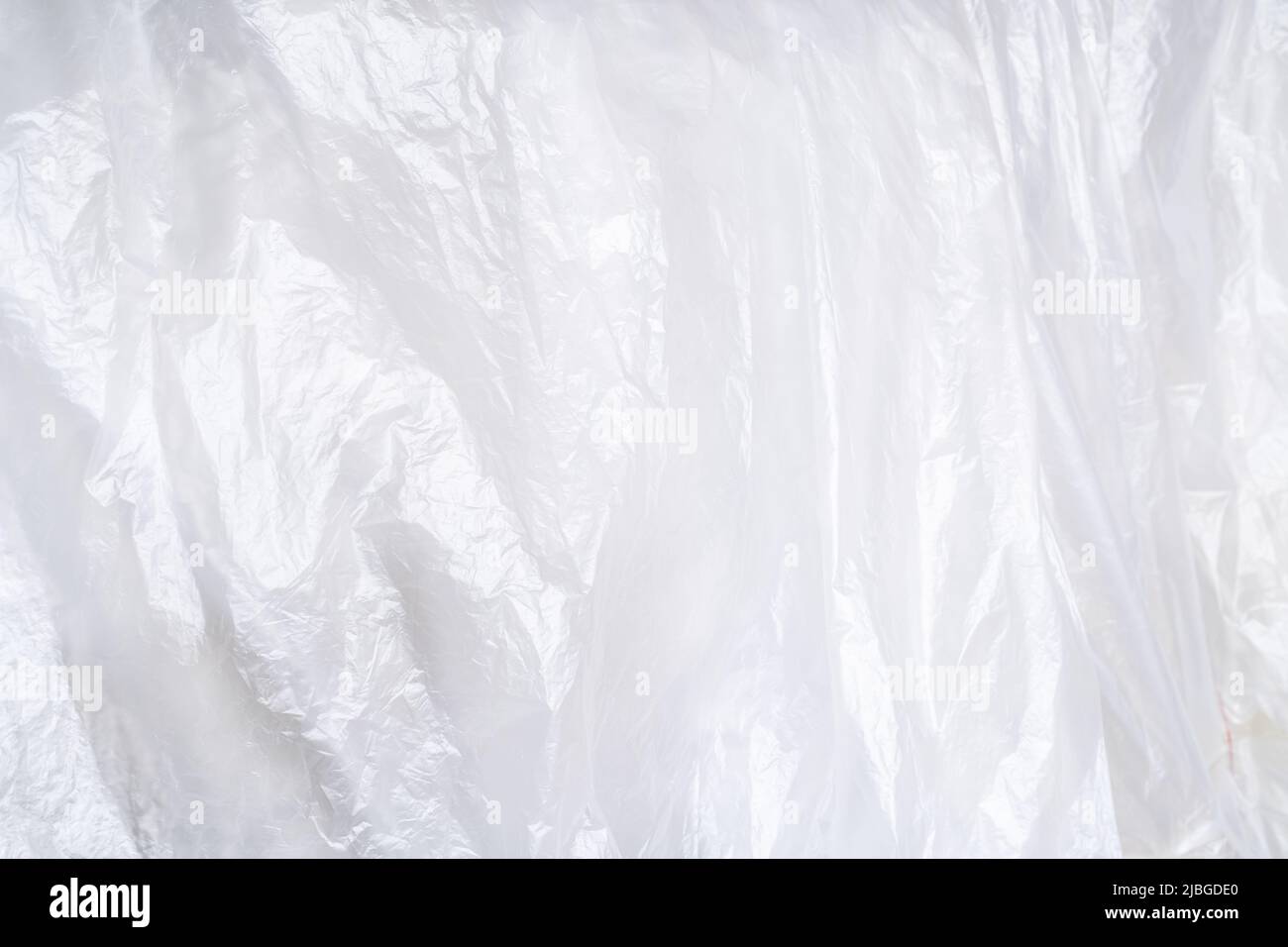 Nahaufnahme eines nahtlosen Fotos der weißen Plastiktüte. Stockfoto