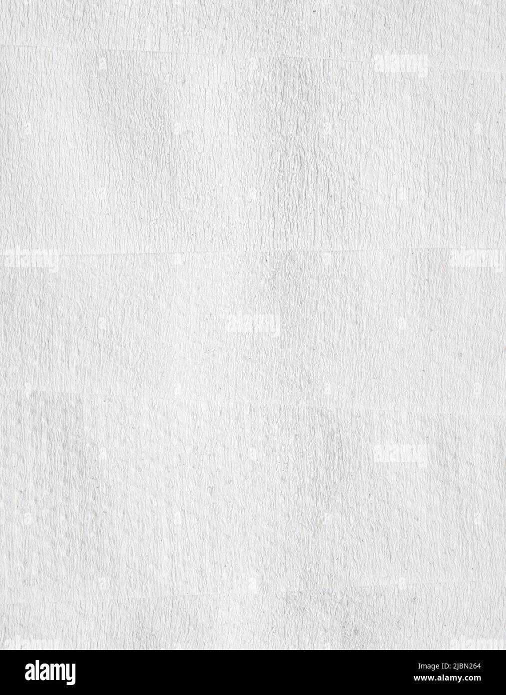 Papierhintergrund. Übereinander gestapelte Papierblätter. Detaillierte Textur aus recyceltem Kraftpapier. Stockfoto