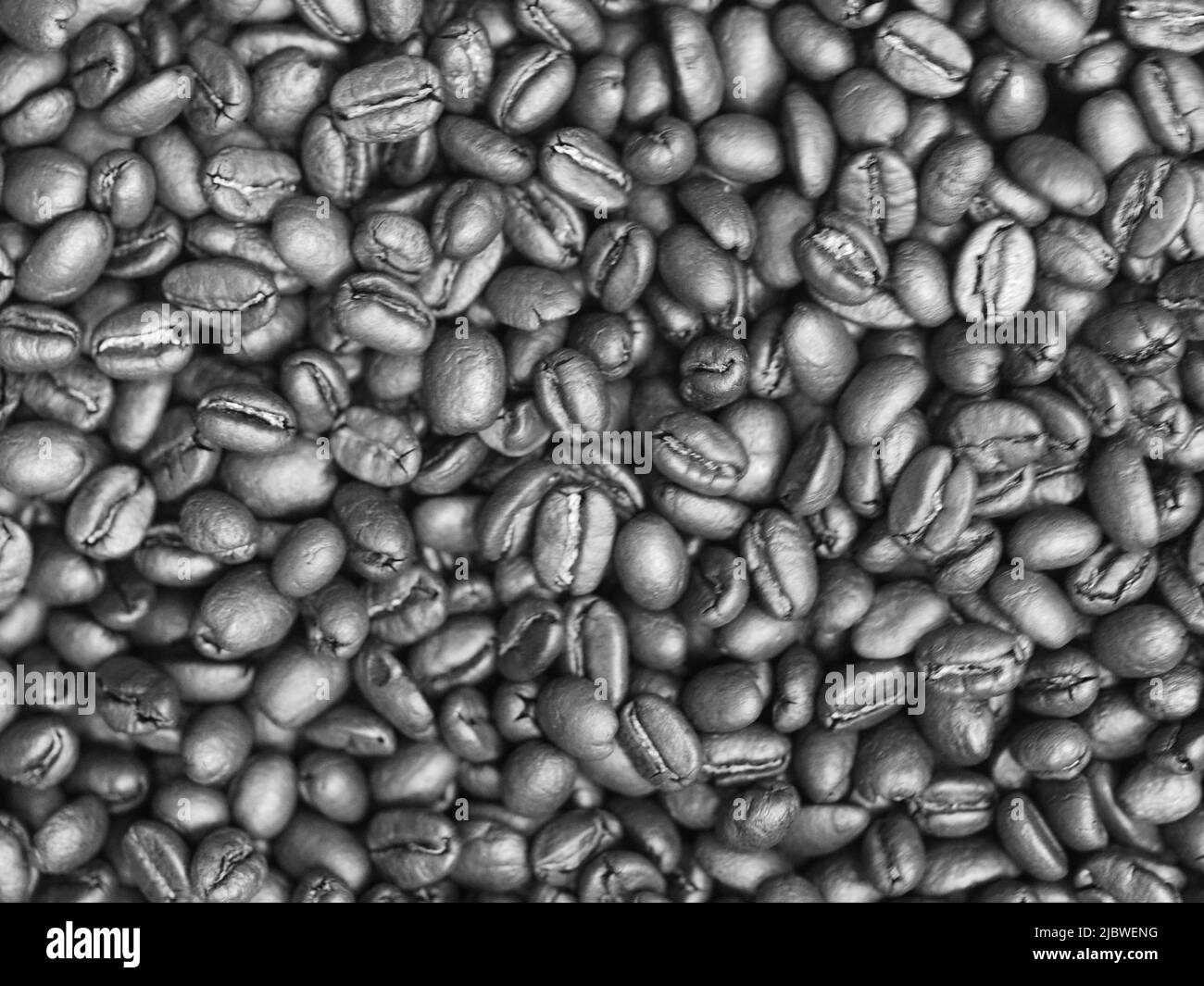 Braun geröstete Kaffeebohnen Makro Nahaufnahme Stockfoto