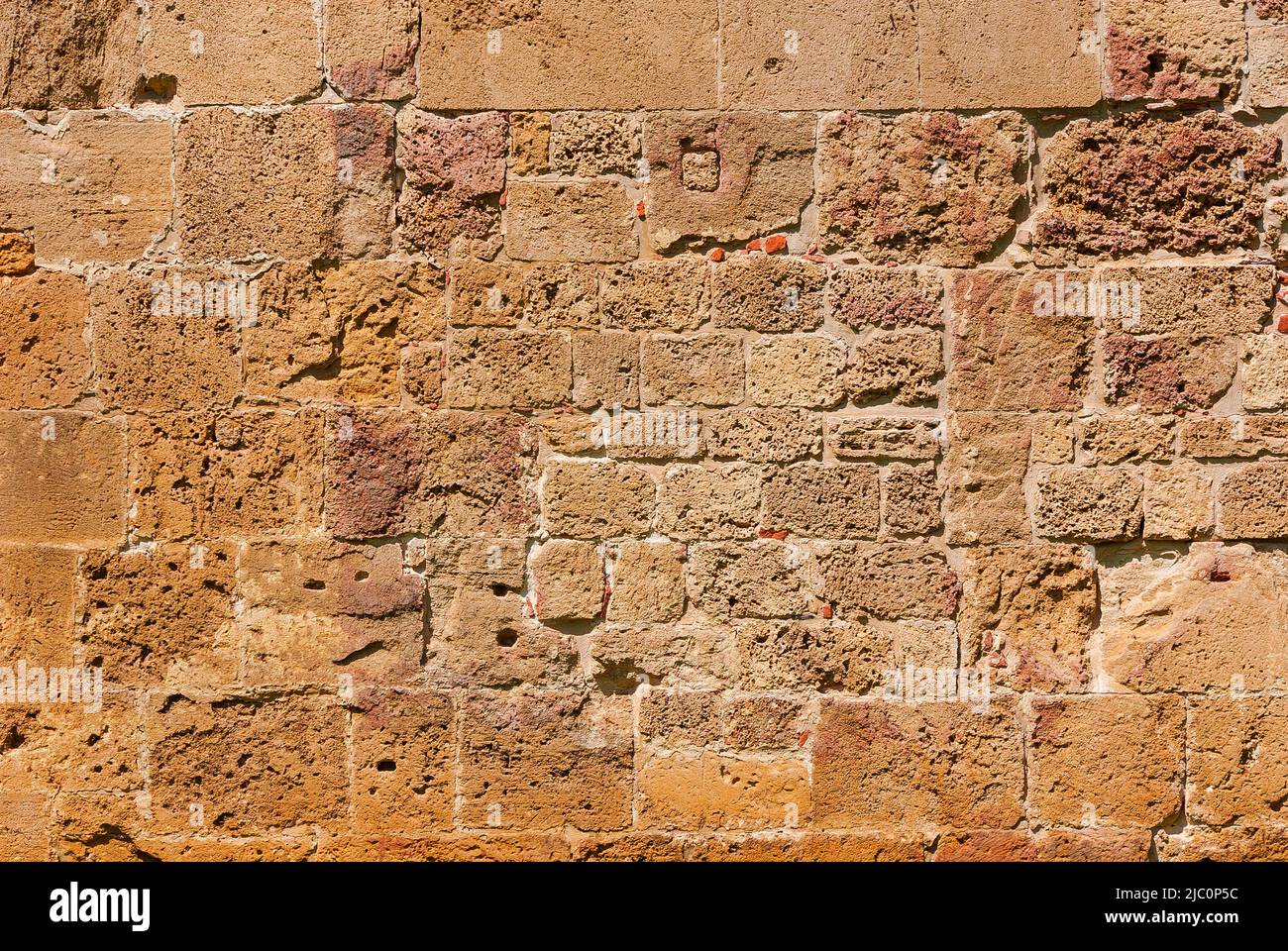 Alte braune Steinmauer als Hintergrund Stockfoto Alte braune Steinmauer als Hintergrund Stockfoto