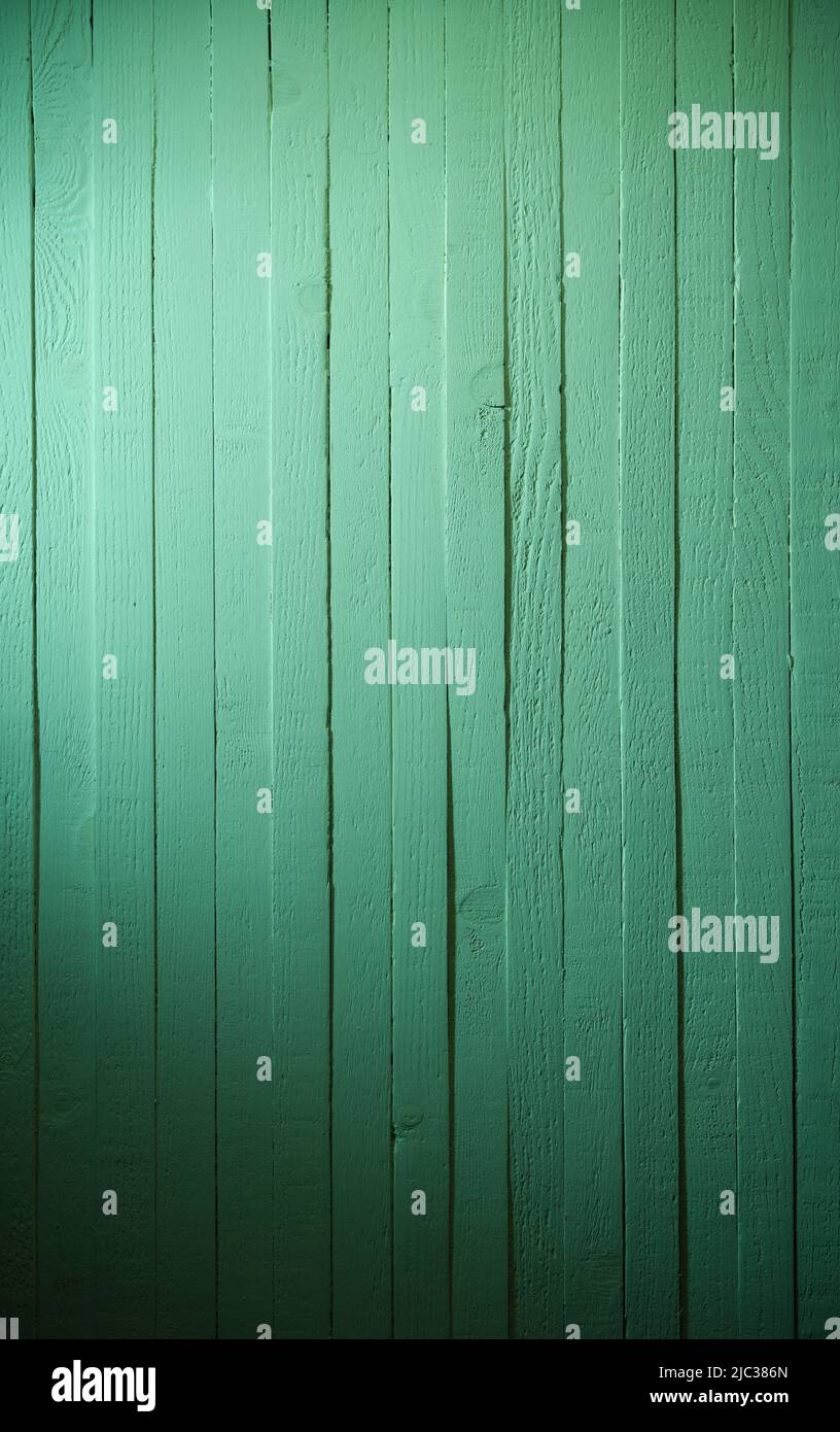 Hellgrünes Holz Wandstruktur. Vertikale grüne Holzwand Stockfoto