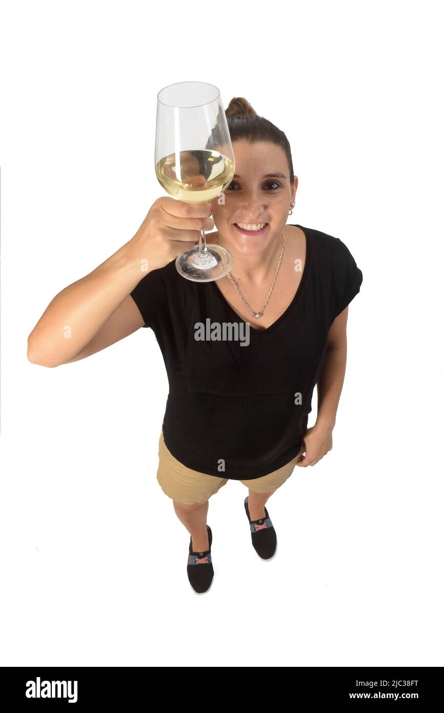 Frau hält einen Coup von Weißwein auf weißem Hintergrund Stockfoto
