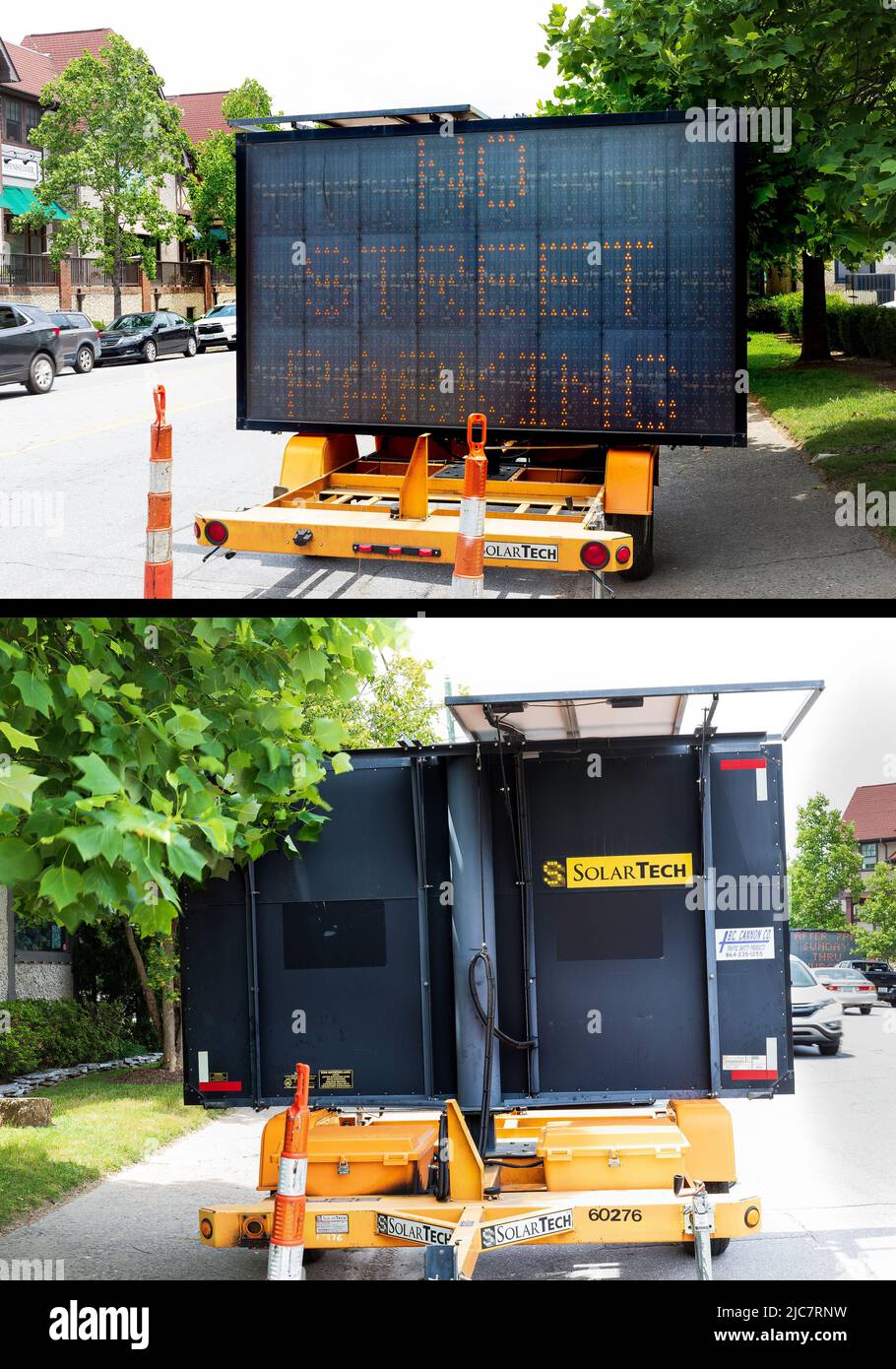 BILTMORE VILLAGE in ASHEVILLE, NC, USA-5 JUNE 2022: Diptychbild mit Vorder- und Rückseite eines mobilen Solar Tech Straßenschildes. Schild mit der Aufschrift „No Street Par Stockfoto